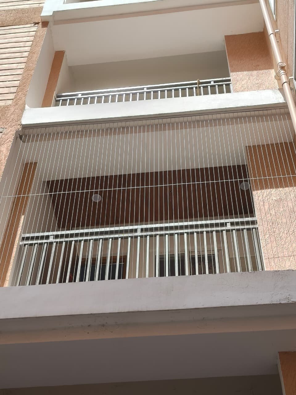 Invisible grill installation viewed from a building exterior