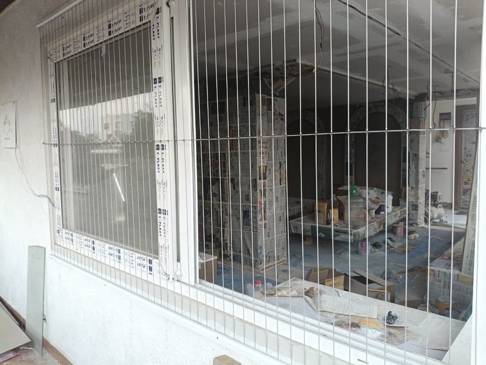Invisible grills protecting sliding apartment windows